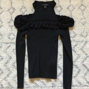 Cold shoulder high neck knit top
